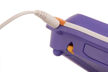 Power jack into the socket at the top right corner of the MobiGo®